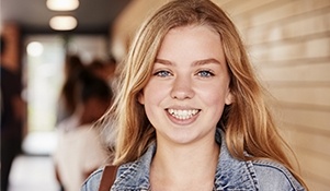 Young woman with straight smile