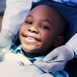 Smiling child in dental chair