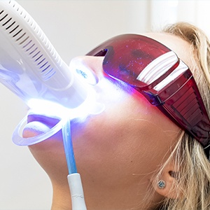 Patient receiving teeth whitening treatment