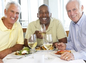 friends smiling and having lunch
