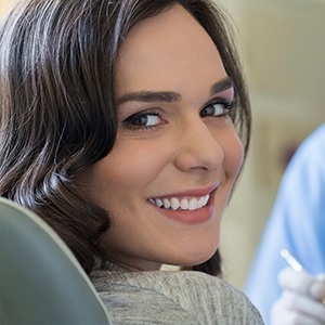 Smiling woman in dental chair